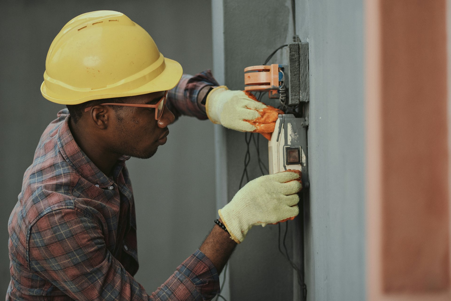 Engineer working on an electrical panel
